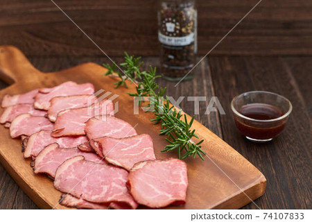 Roast beef assorted on a cutting board Roast beef assorted on a cutting board 74107833