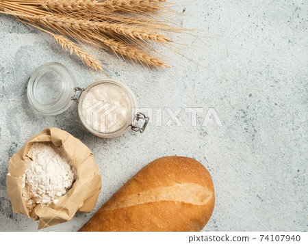 Baking ingredients with sourdough starter Baking ingredients with sourdough starter 74107940