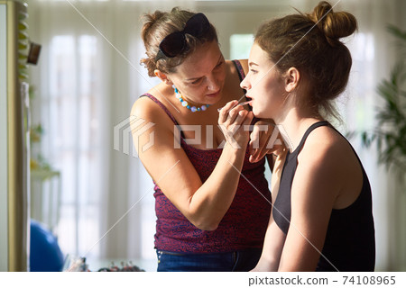 Artist applying make-up 74108965