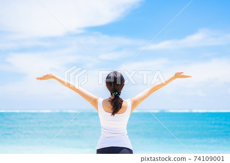 Female health image sea background 74109001