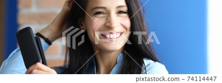 Attractive laughing lady in room Attractive laughing lady in room 74114447
