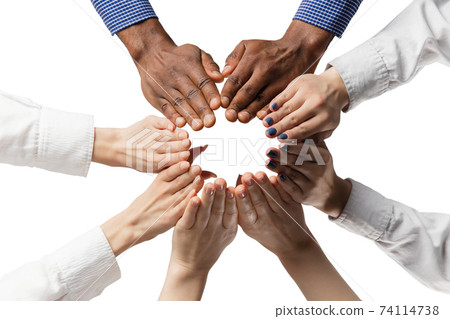 Business people giving high fiving each other isolated over white background. 74114738
