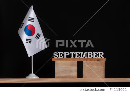 Wooden calendar of September with South Korea flag on black background. Dates of South Korea in September Wooden calendar of September with South Korea flag on black background. Dates of South Korea in September 74115021
