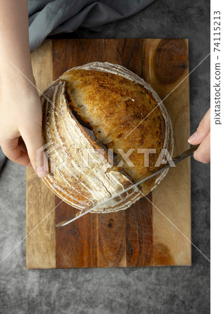 Sourdough rustic bread. Traditional homemade bread, top view Sourdough rustic bread. Traditional homemade bread, top view 74115213