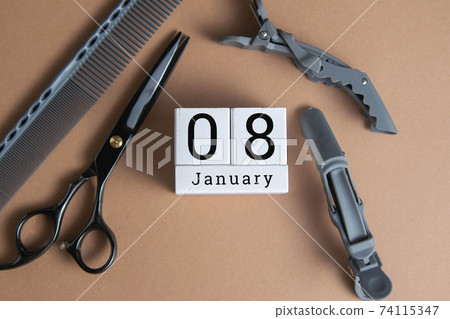 January 8 on the wooden calendar.The eighth day of the winter month, a calendar for the workplace. Winter January 8 on the wooden calendar.The eighth day of the winter month, a calendar for the workplace. Winter 74115347