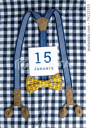 January 15 on the wooden calendar.The fifteenth day of the winter month, a calendar for the workplace. Winter January 15 on the wooden calendar.The fifteenth day of the winter month, a calendar for the workplace. Winter 74115353