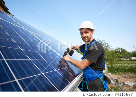 Stand-alone exterior solar panel system installation, renewable green energy generation concept. 74115687