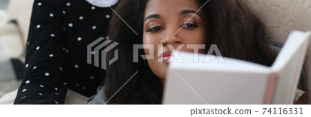 Smiling females discuss plot 74116331