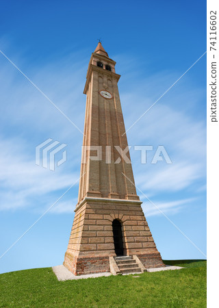Bell Tower of a Church on Blue Sky with Clouds - Italy Bell Tower of a Church on Blue Sky with Clouds - Italy 74116602