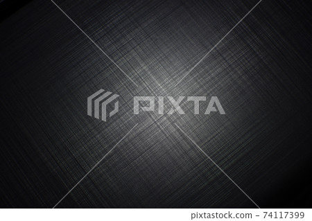 Black metal striped textured background with a light of spotlight Black metal striped textured background with a light of spotlight 74117399