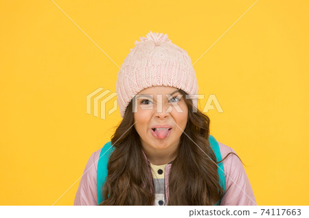 Ugh, yuck. Little schoolchild stick tongue. Little kid make grimace Ugh, yuck. Little schoolchild stick tongue. Little kid make grimace 74117663