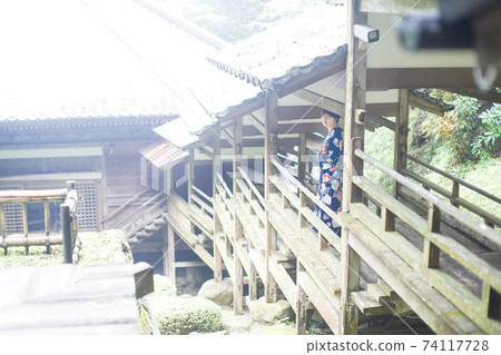 Girl in temple garden and yukata Girl in temple garden and yukata 74117728