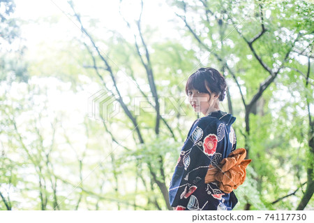 Girl in temple garden and yukata Girl in temple garden and yukata 74117730