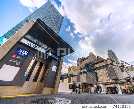Tokyo cityscape of Japan: Elevator (air valve in front) of Shibuya station, subway / Shibuya station (doorway), JR Shibuya station / doorway Tokyo cityscape of Japan: Elevator (air valve in front) of Shibuya station, subway / Shibuya station (doorway), JR Shibuya station / doorway 74118391