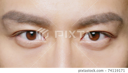 close up of male eye close up of male eye 74119171