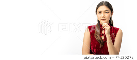 Young beautiful Chinese woman in traditional Chinese dress looking and smiling at camera on white background Young beautiful Chinese woman in traditional Chinese dress looking and smiling at camera on white background 74120272