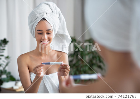 Excellent mood, happy facial expression and emotions of expectant mother 74121765