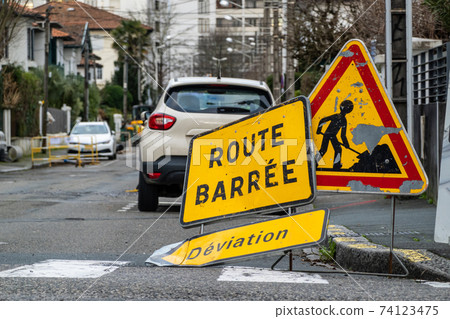Road closed and diversion signs in French town 74123475