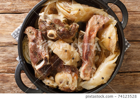 lamb and cabbage or known as farikal is Norway's national dish close-up in a pan. Horizontal top view lamb and cabbage or known as farikal is Norway's national dish close-up in a pan. Horizontal top view 74123528