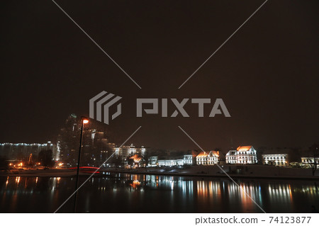 Panoramic view of Svisloch river with Trinity suburb in the evening in winter. Minsk. Belarus.  74123877