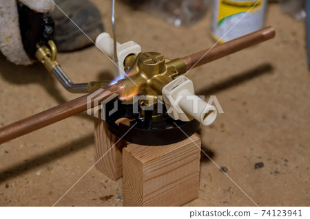 Welding soldering copper pipes on bathtub shower diverter 74123941