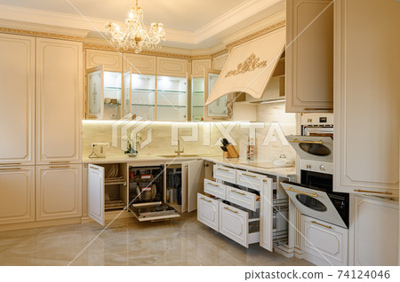 Luxury beige and gold classic kitchen interior 74124046