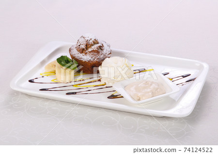 Tasty hot muffin with ice cream 74124522