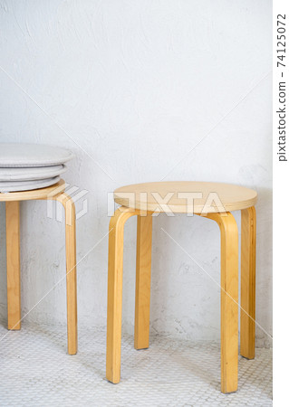 Wooden stool in the minimal style. Wooden stool in the minimal style. 74125072