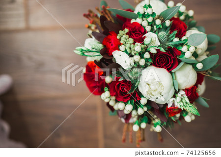 Wonderful luxury wedding bouquet of different flowers Wonderful luxury wedding bouquet of different flowers 74125656