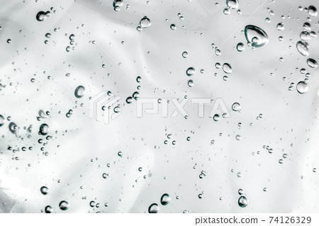 Liquid cream gel, green blue cosmetic texture with bubbles 74126329