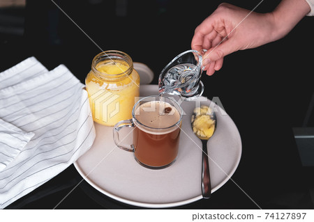 Bulletproof coffee, keto breakfast made with butter and MCT oil 74127897