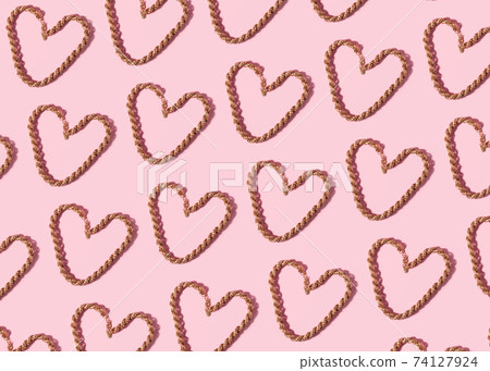 Trendy valentines day pattern with golden necklace heart on pink Trendy valentines day pattern with golden necklace heart on pink 74127924