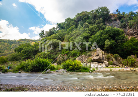 Long exposure image of Alcantara gorge in Sicily, Italy Long exposure image of Alcantara gorge in Sicily, Italy 74128381