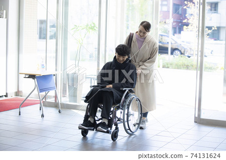 Wheelchair hospital family Wheelchair hospital family 74131624