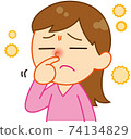 A woman whose nose is itchy due to pollen 74134829