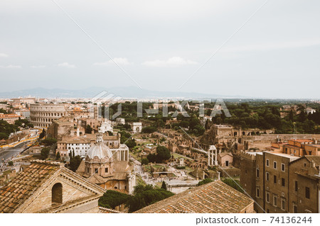 Panoramic view of city Rome with Roman forum and Colosseum from Vittoriano Panoramic view of city Rome with Roman forum and Colosseum from Vittoriano 74136244