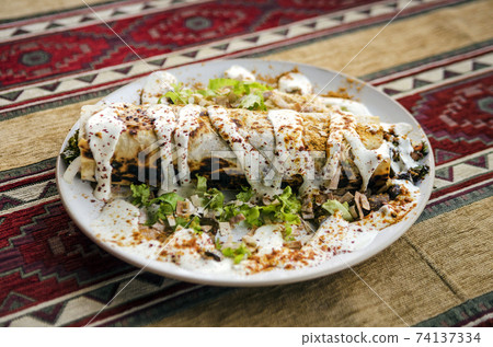 kebeb chicken wrap plate snack meal with garlic sauce 74137334