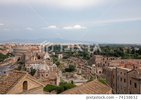 Panoramic view of city Rome with Roman forum and Colosseum from Vittoriano Panoramic view of city Rome with Roman forum and Colosseum from Vittoriano 74138632