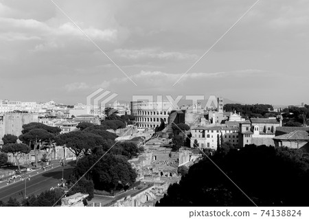 Panoramic view of city Rome with Roman forum and Colosseum from Vittoriano 74138824