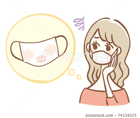 A woman worried about having makeup on her mask A woman worried about having makeup on her mask 74139325