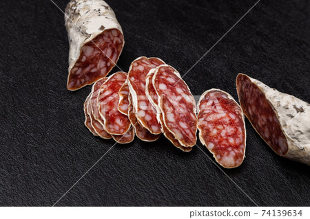 Salami is Italian dry sausage 74139634