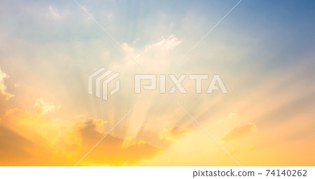 sky and clouds nature background,yellow sun light on sky with sun rays sky and clouds nature background,yellow sun light on sky with sun rays 74140262