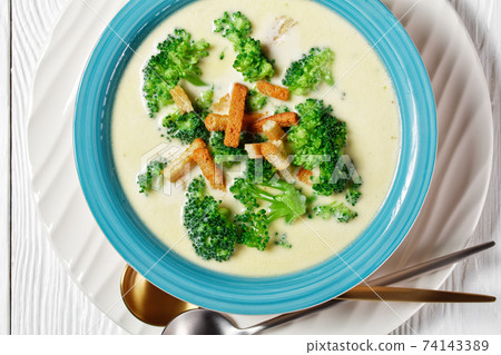 cream soup with broccoli and croutons in a bowl cream soup with broccoli and croutons in a bowl 74143389
