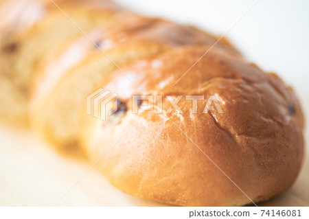 Grape walnut bread on a cutting board Grape walnut bread on a cutting board 74146081