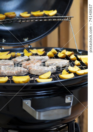 grilled tuna with potatoes on garden grill 74148687