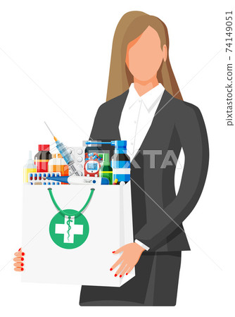 Woman holding drugstore bag Woman holding drugstore bag 74149051