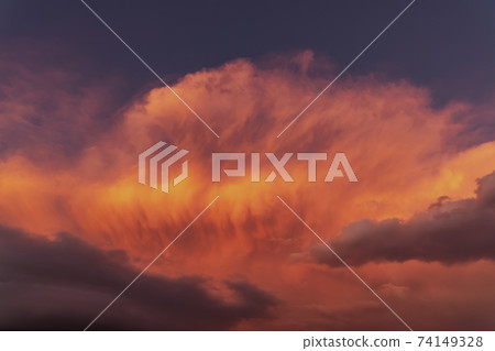 orange and red clouds at sunset 74149328