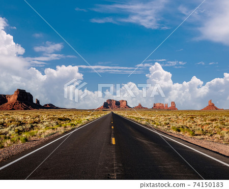 Empty scenic highway in Monument Valley 74150183