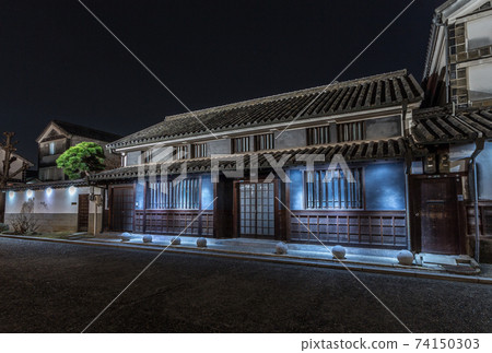 Night view of historic canal-side buildings, Kurashiki, Japan 74150303
