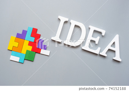 IDEA text with colorful wood puzzle pieces on gray background. logical thinking, business logic, Conundrum, inspiration, solutions, rational, mission, success, goals and strategy concepts IDEA text with colorful wood puzzle pieces on gray background. logical thinking, business logic, Conundrum, inspiration, solutions, rational, mission, success, goals and strategy concepts 74152188
